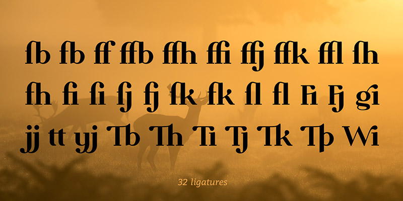 Milk Drops Font. Demonstration of all 32 ligatures against an afternoon-sun-drenched field with grazing deer.
